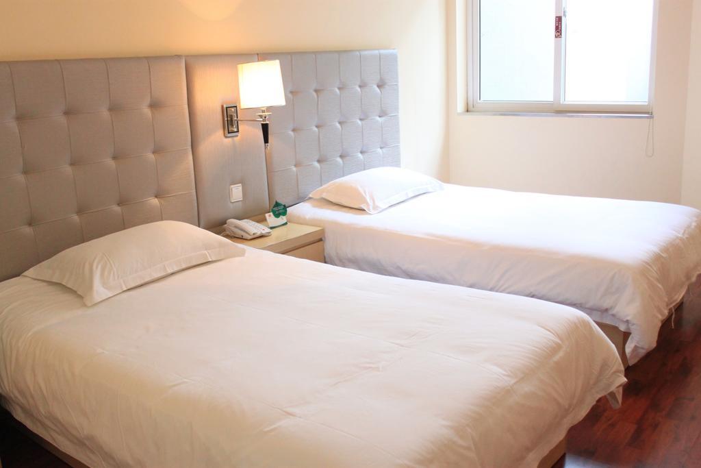Qingdao Renjia Bussiness Hotel Room photo